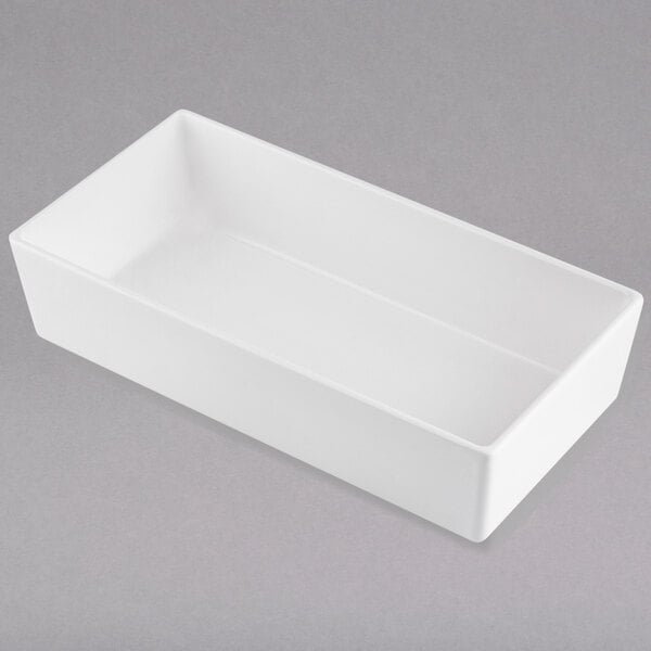A white rectangular Tablecraft bowl with a rectangular bottom.