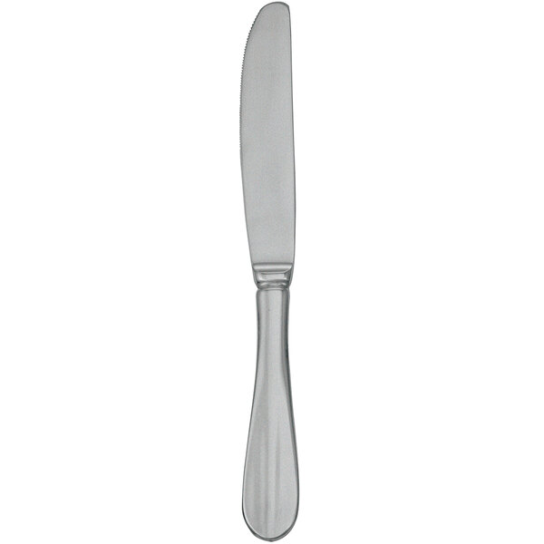 A Walco Fieldstone Finish stainless steel dinner knife with a silver handle.