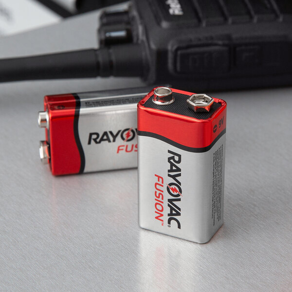 A package of two Rayovac Fusion 9V batteries on a table.