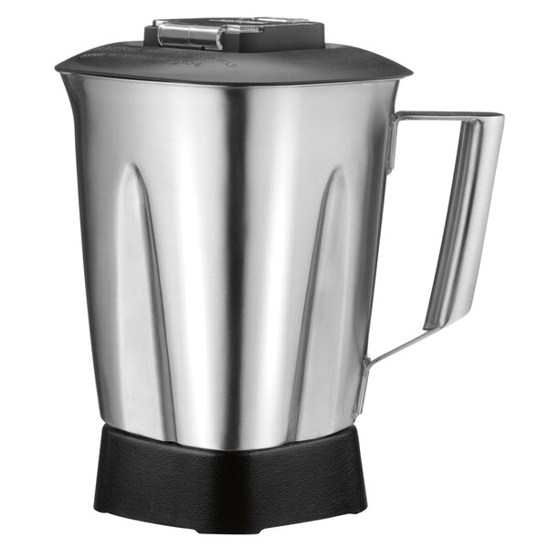 A Waring stainless steel blender jar with a black handle.