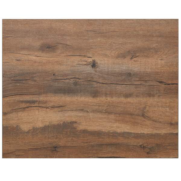 A BFM Seating Relic Knotty Pine rectangular table top with a wood grained surface.
