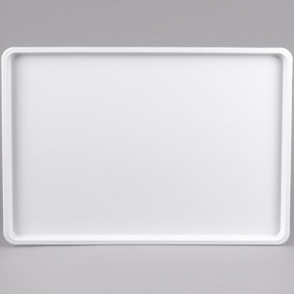 A white rectangular Winholt display tray with a white border.