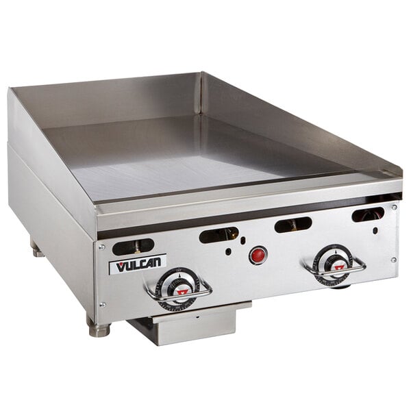 A Vulcan stainless steel countertop gas griddle with thermostatic controls.