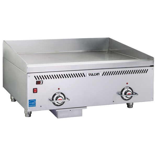 A Vulcan stainless steel natural gas griddle on a counter.