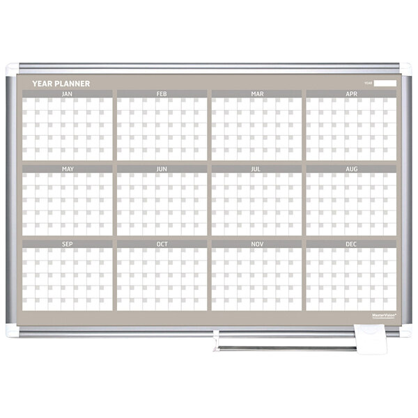 A white calendar with white squares and a silver frame.