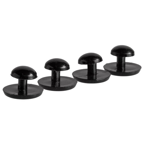 A Henry Segal black plastic shirt stud replacement - 4 pack with round tops.