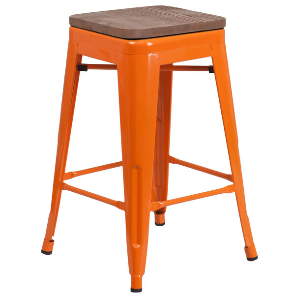 An orange Flash Furniture stackable metal counter height stool with a square wood seat.