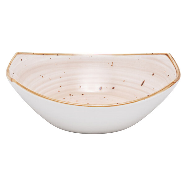 A white bowl with brown specks on it.