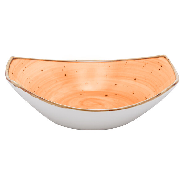 A Maize orange china bowl with a white rim and speckled surface.