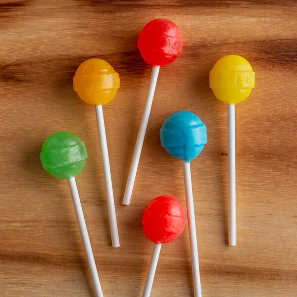A group of lollipops on paper lollipop sticks.