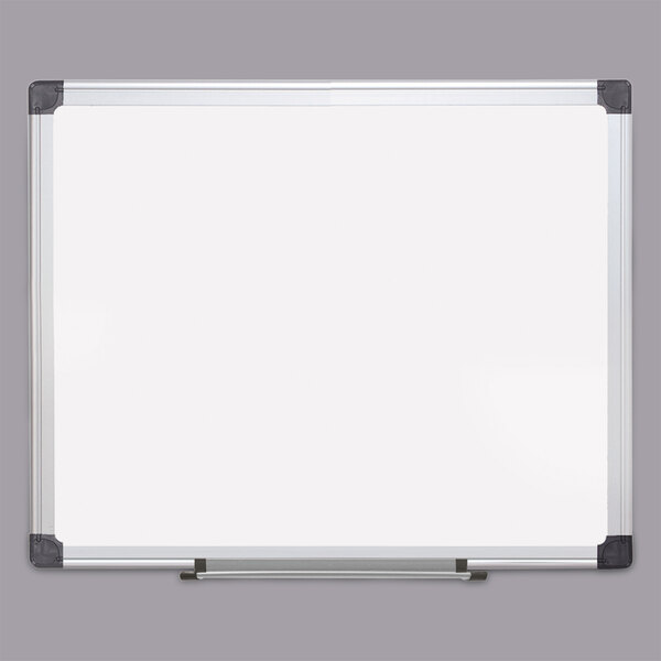 A MasterVision white board with black corners and an aluminum frame.