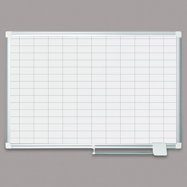 A white board with a 1" x 2" grid on it.
