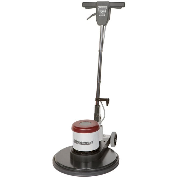 A Minuteman front runner dual speed rotary floor machine with a red and white handle.