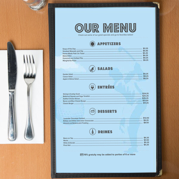 Menu paper with a Country Club themed golf silhouette design on a table.