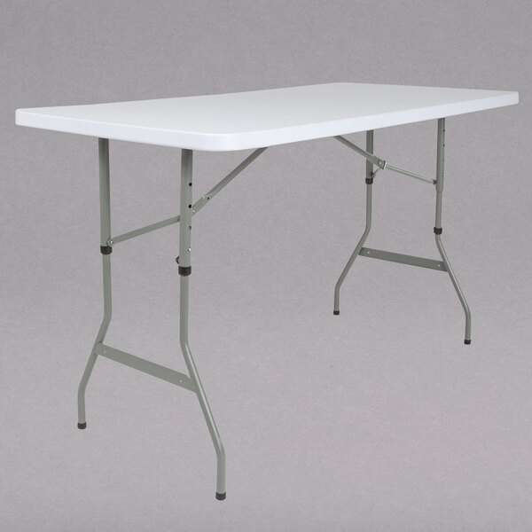 A Flash Furniture rectangular white plastic folding table with metal legs.