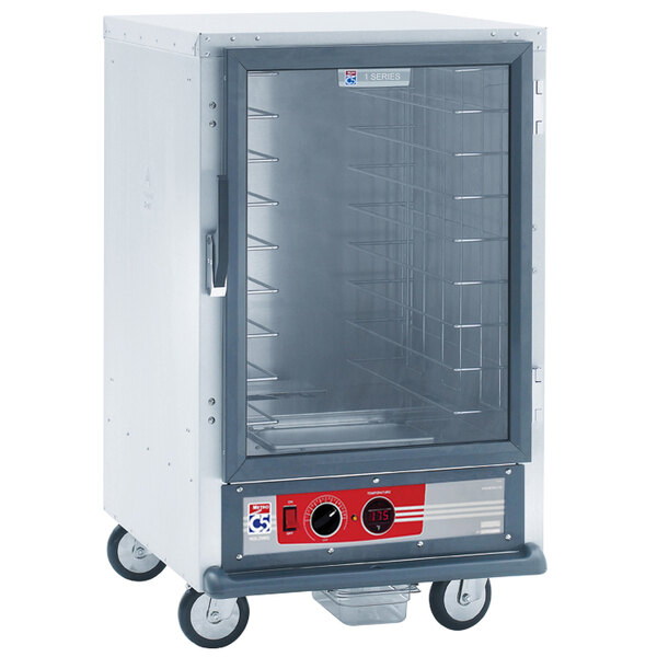A Metro C5 1 Series heated holding cabinet with a clear glass door.