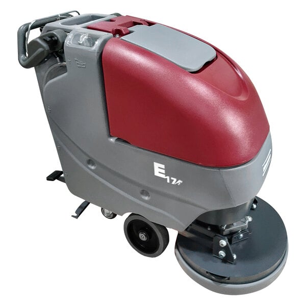 A red and grey Minuteman E17 cordless walk behind floor scrubber with wheels.