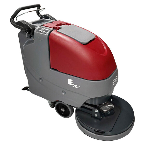 A red and grey Minuteman E20 walk behind floor scrubber with wheels.