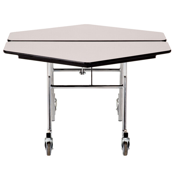 A white hexagonal cafeteria table with a black T-molding edge and wheels.