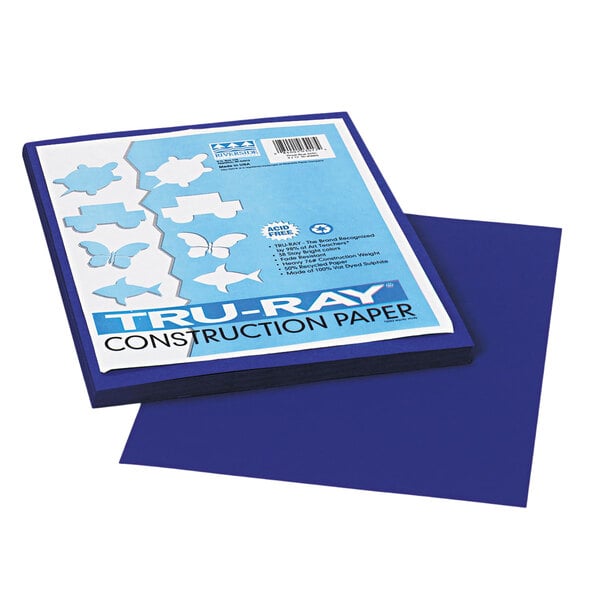 A stack of Pacon Royal Blue construction paper.
