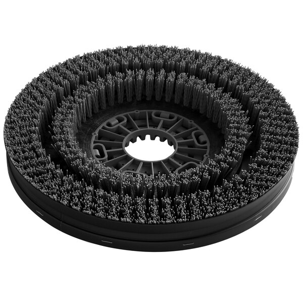 A black circular Minuteman disc brush with bristles.