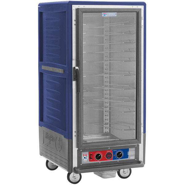 A blue and silver Metro C5 3 Series holding and proofing cabinet on wheels.