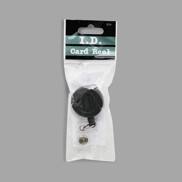 A black plastic BaumGartens ID card reel in a plastic bag with a black circle inside.