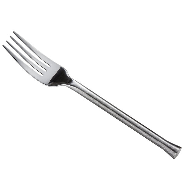 An Oneida Wyatt stainless steel dinner fork with a silver handle.