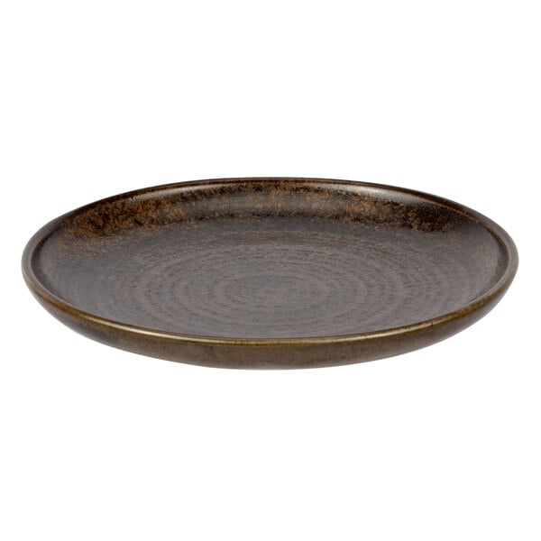 A brown Bon Chef Tavola Eros porcelain plate with a circular design.