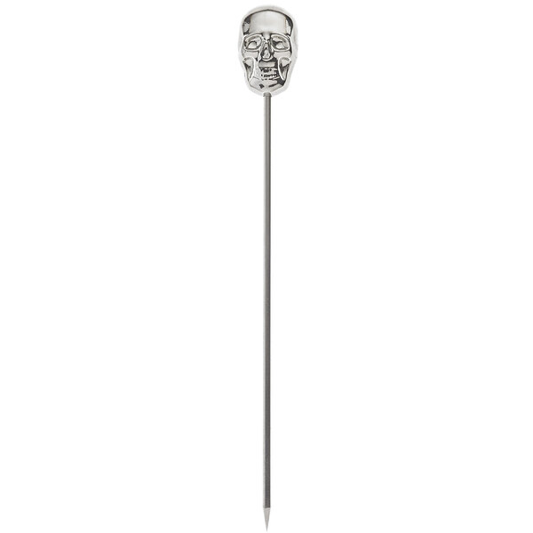 A metal stick with a stainless steel skull on top.