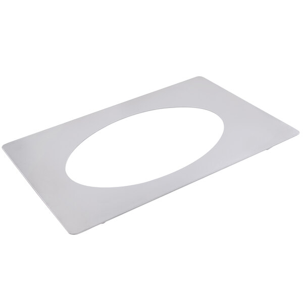 A white rectangular tile with a circular hole in the middle.