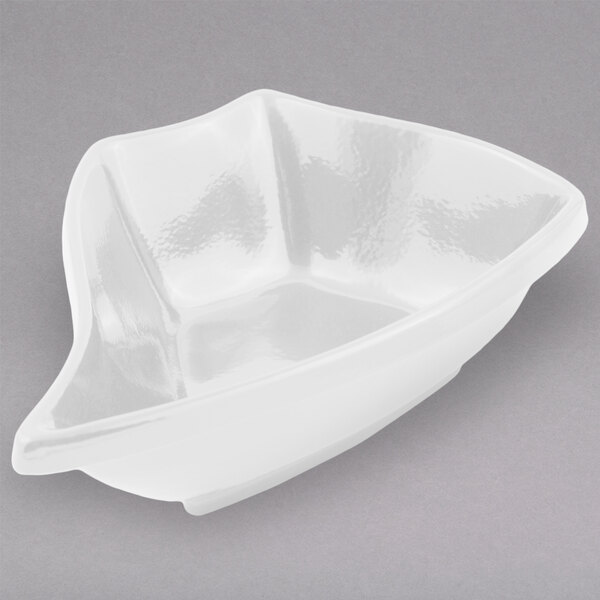 A white Bon Chef cast aluminum bowl with a curved edge.