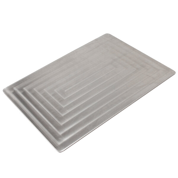 A Bon Chef stainless steel rectangle tile with a pattern on it.