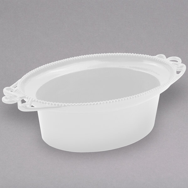A white Bon Chef cast aluminum bowl with handles.