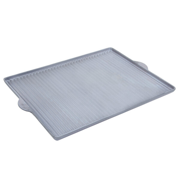 A Bon Chef rectangular pewter-glo cast aluminum grill pan on a counter.