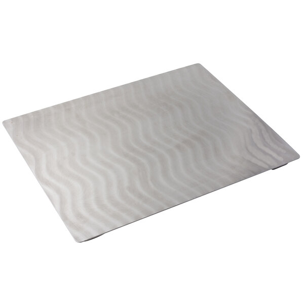 A white square stainless steel tile with a wavy design.
