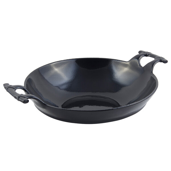 A black pan with handles.