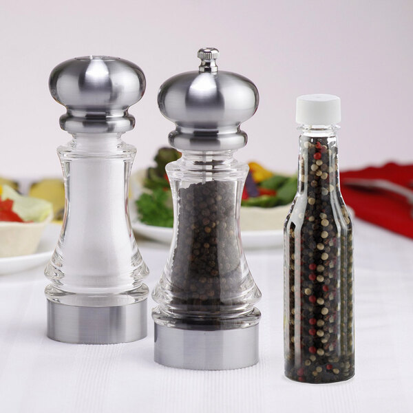 A Chef Specialties Lehigh pepper mill and salt shaker set on a table.