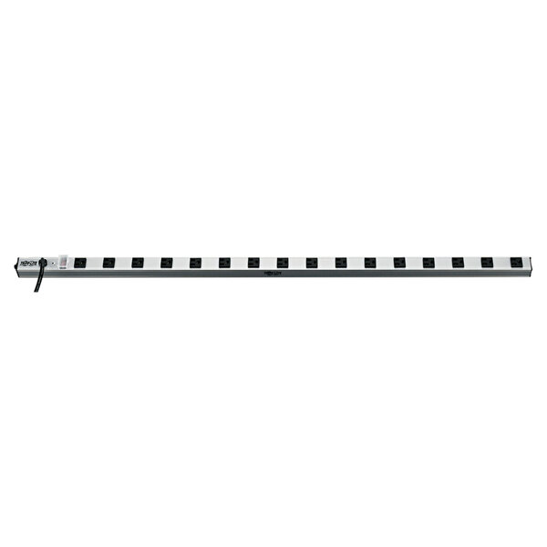 A long rectangular silver metal Tripp Lite power strip with black square outlets.