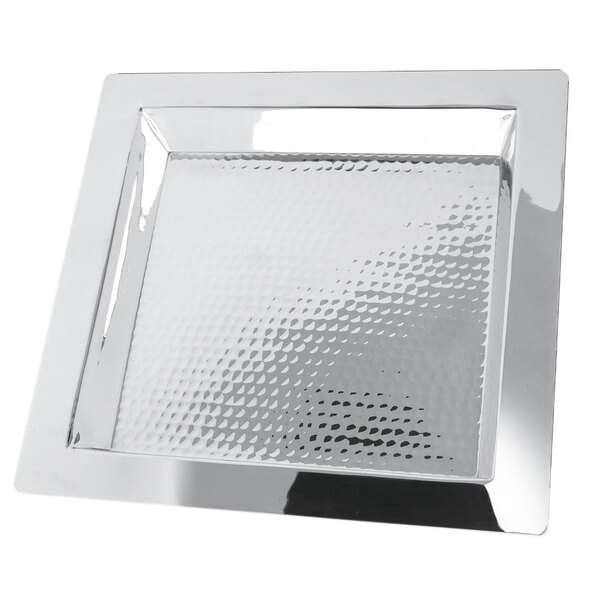 A silver square stainless steel tray with a hammered finish.