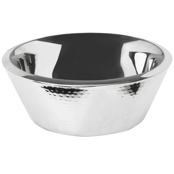A shiny silver Eastern Tabletop stainless steel bowl with a hammered design.