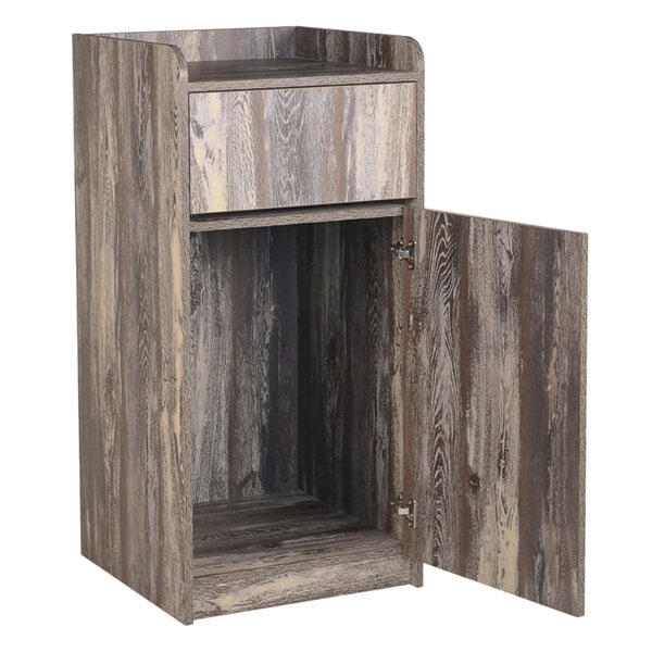 A wooden BFM Seating waste can enclosure with a door open.
