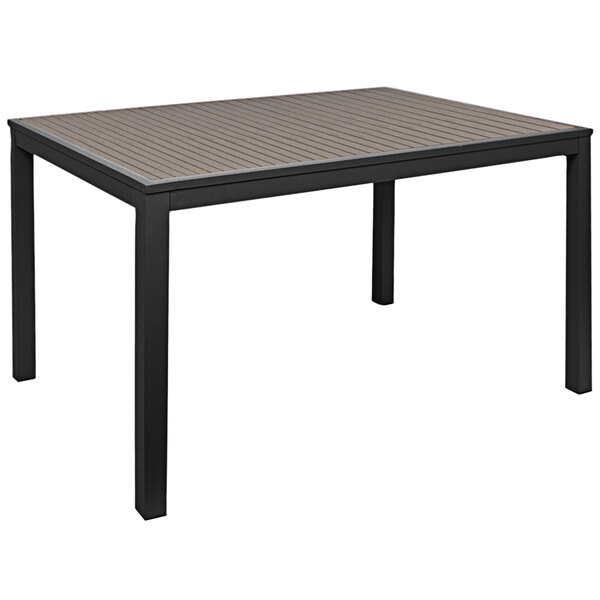 A BFM Seating rectangular table with black legs and a gray synthetic teak top.