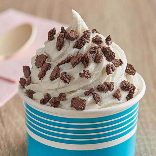 A close up of a cup of ice cream with Dutch Treat chopped chocolate cookies.