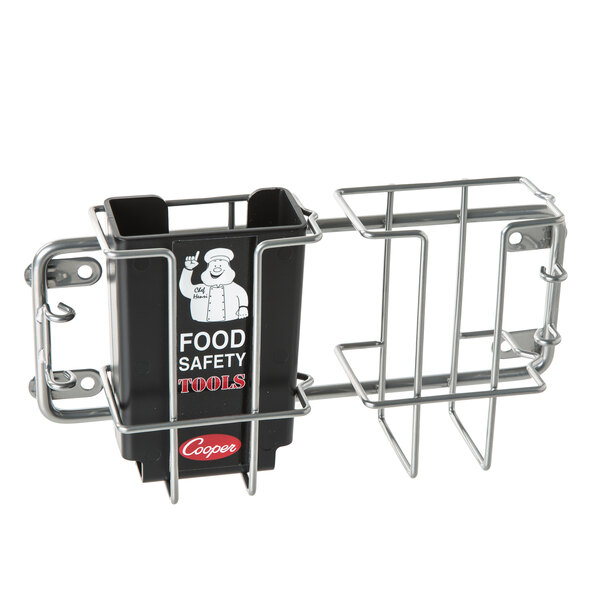 A black metal wire rack with a black plastic container on a shelf.
