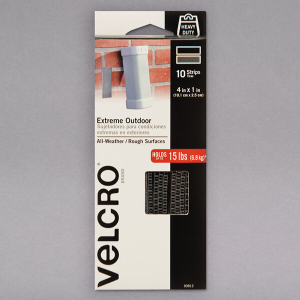 A package of Velcro® titanium outdoor fasteners with black hook and loop strips.