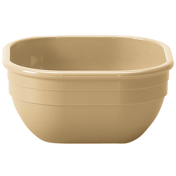 A beige Cambro square polycarbonate bowl.
