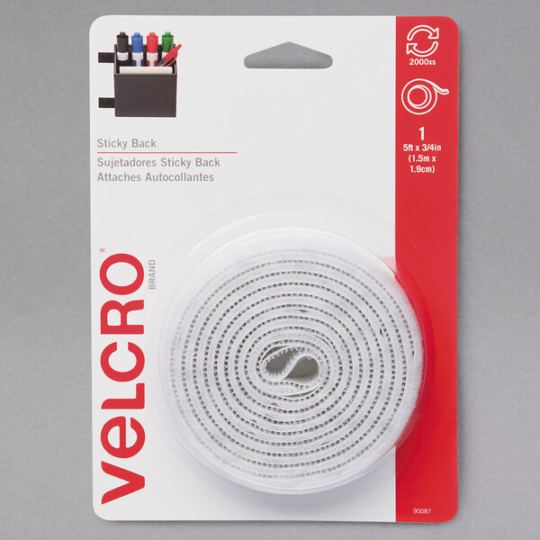 A package of Velcro brand white sticky-back tape with a roll inside.