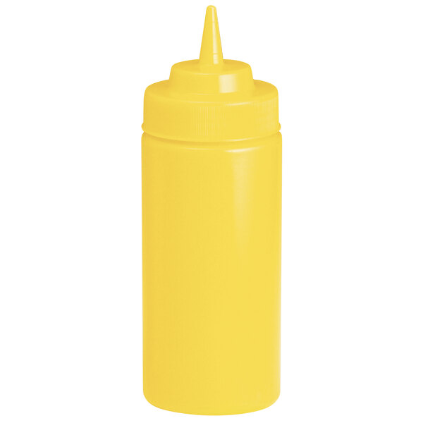 A yellow plastic Tablecraft squeeze bottle with a yellow cone tip lid.