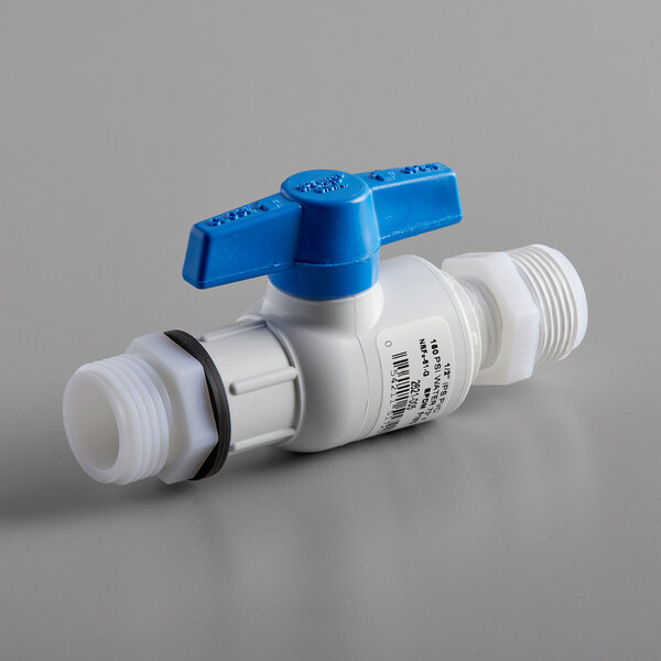 A white plastic valve with a blue handle.
